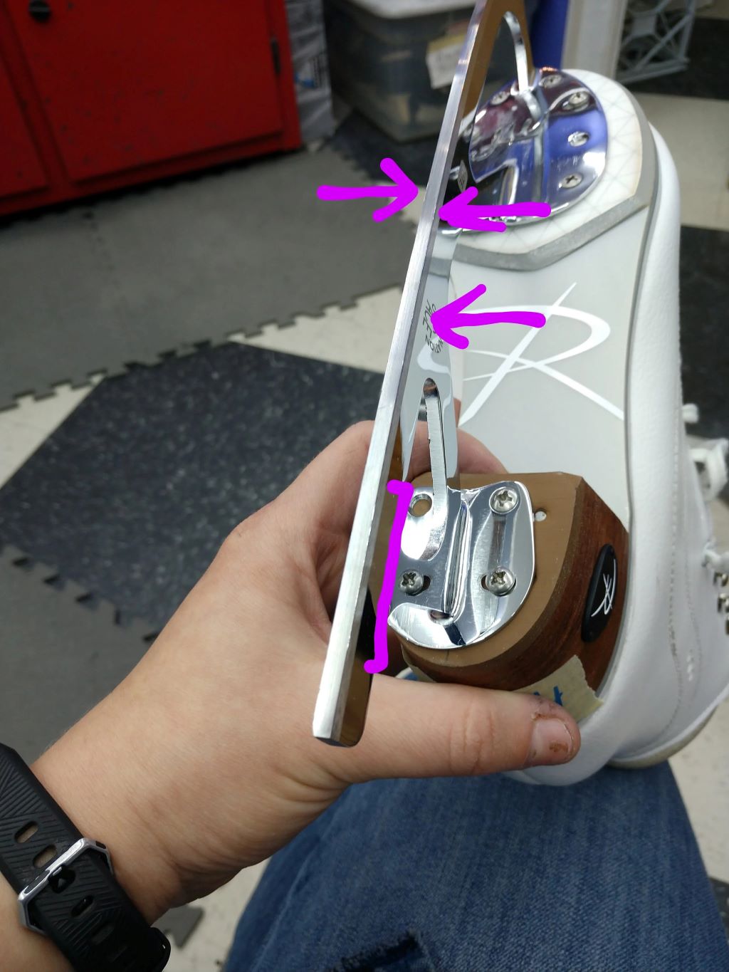 Ice skate blade being sharpened with a professional sharpening machine, restoring a precise edge for better performance in New York